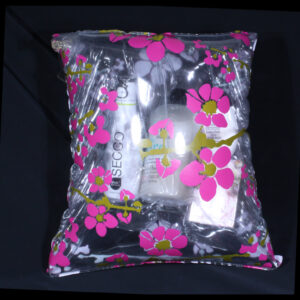 Verstopt cadeautje voor vrouw - Genieten met Cocos. Een opblaasbaar tasje/kussentje gevuld met heerlijke cocos producten en wijn.