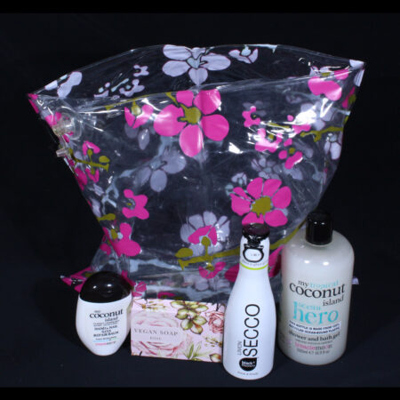 Verstopt cadeautje voor vrouw - Genieten met Cocos. Een opblaasbaar tasje/kussentje gevuld met heerlijke cocos producten en wijn.