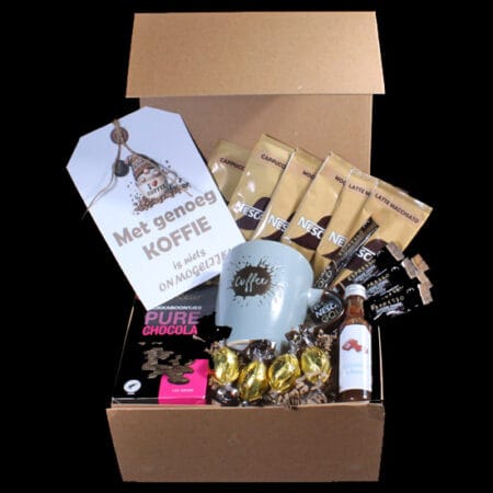 Koffie cadeaubox van De Verrassingsmand met grote mok, diverse koffiesmaken, espresso, chocoladebonbons en flesje chocolade likeur.
